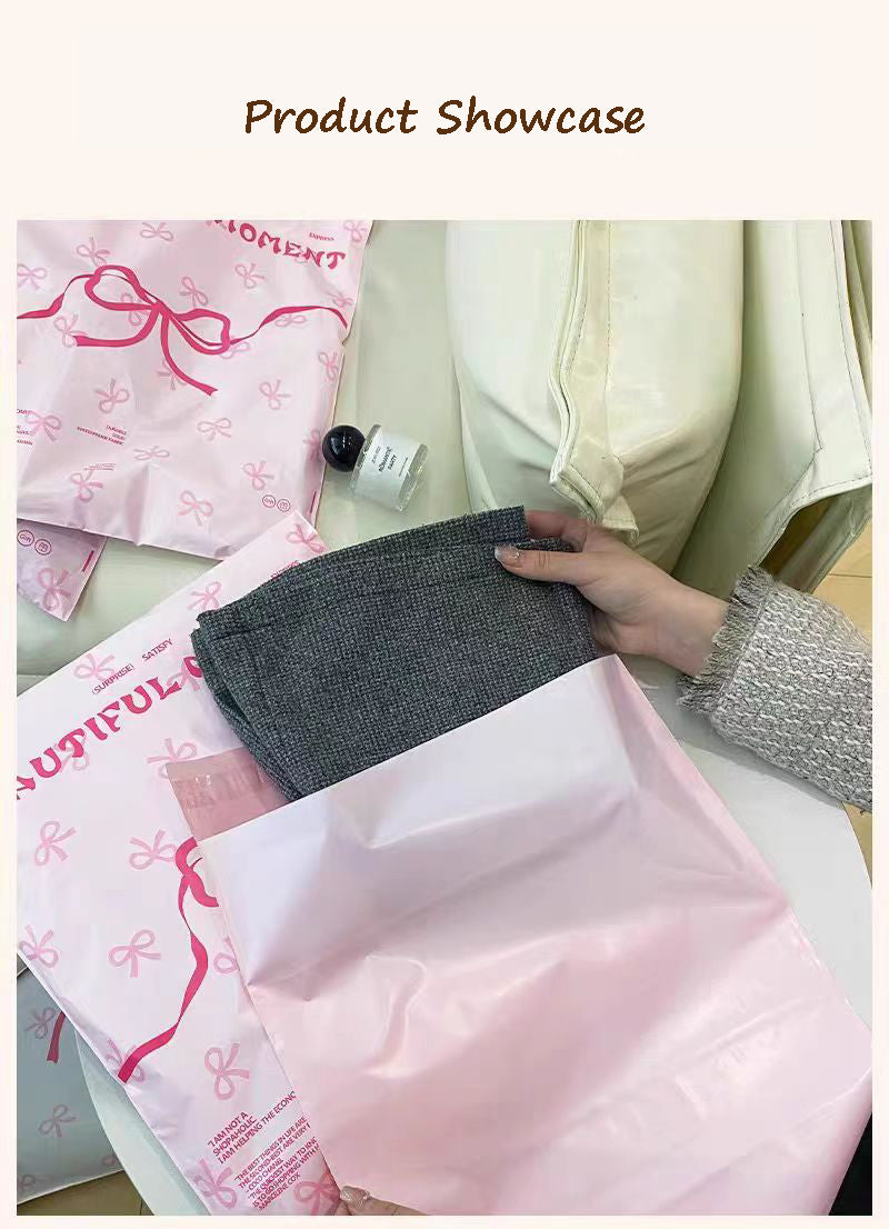 Pink bow-tie express delivery bag, clothing packaging bag, express delivery packing bag, thickened colorful express delivery bag wholesale.