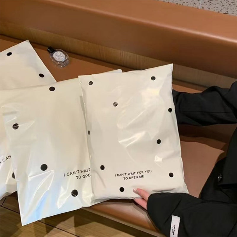 Pink bow-tie express delivery bag, clothing packaging bag, express delivery packing bag, thickened colorful express delivery bag wholesale.