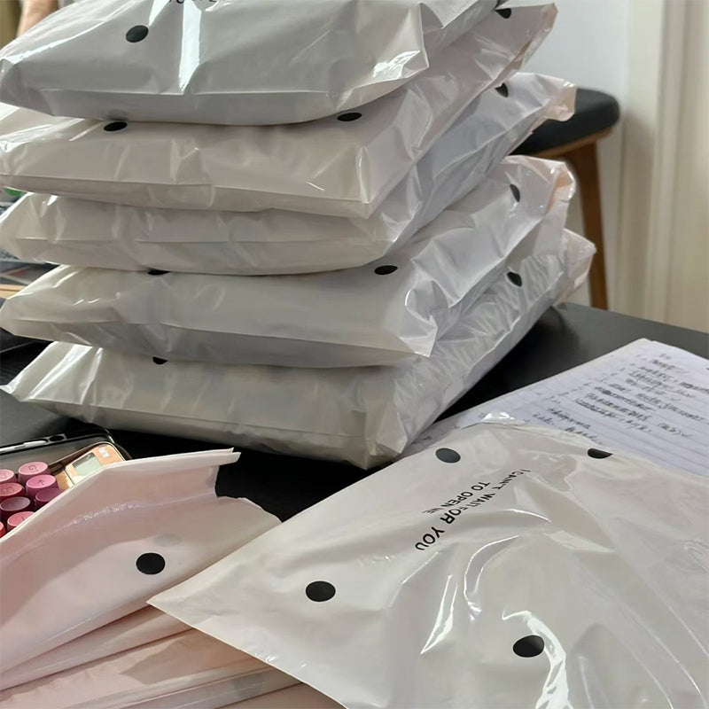 Pink bow-tie express delivery bag, clothing packaging bag, express delivery packing bag, thickened colorful express delivery bag wholesale.