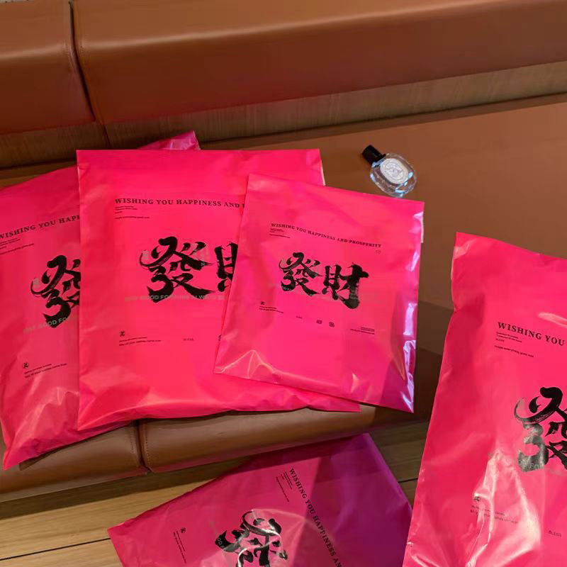 Pink bow-tie express delivery bag, clothing packaging bag, express delivery packing bag, thickened colorful express delivery bag wholesale.