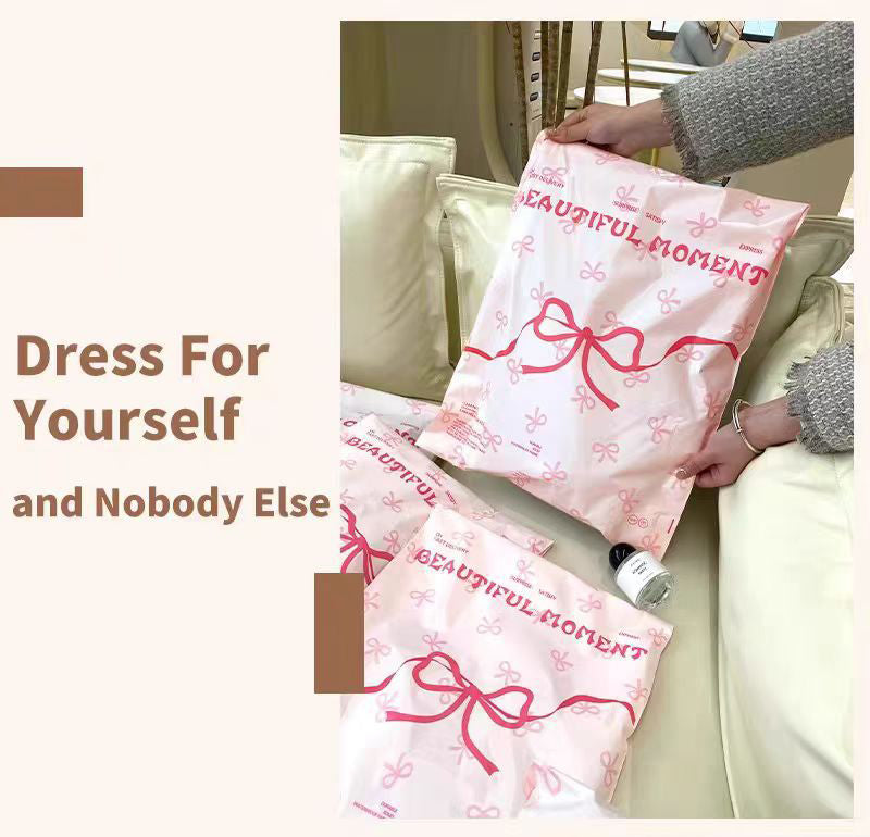 Pink bow-tie express delivery bag, clothing packaging bag, express delivery packing bag, thickened colorful express delivery bag wholesale.