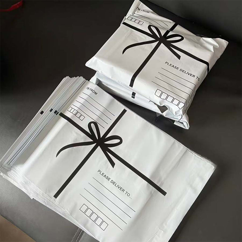 Pink bow-tie express delivery bag, clothing packaging bag, express delivery packing bag, thickened colorful express delivery bag wholesale.